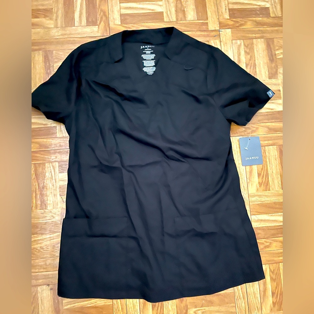 NWT never worn black Jannuu scrub too! Retails for $48